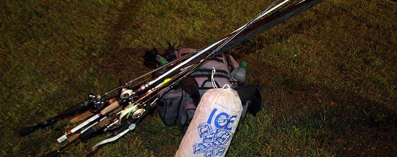 Rod and reels, tackle bag and a bag of ice